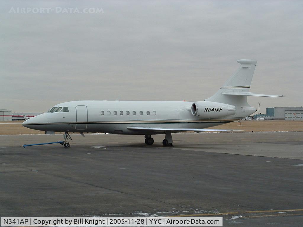 N341AP, 2003 Dassault Falcon 2000EX C/N 24, Parked at exec.  Next day was covered in snow.