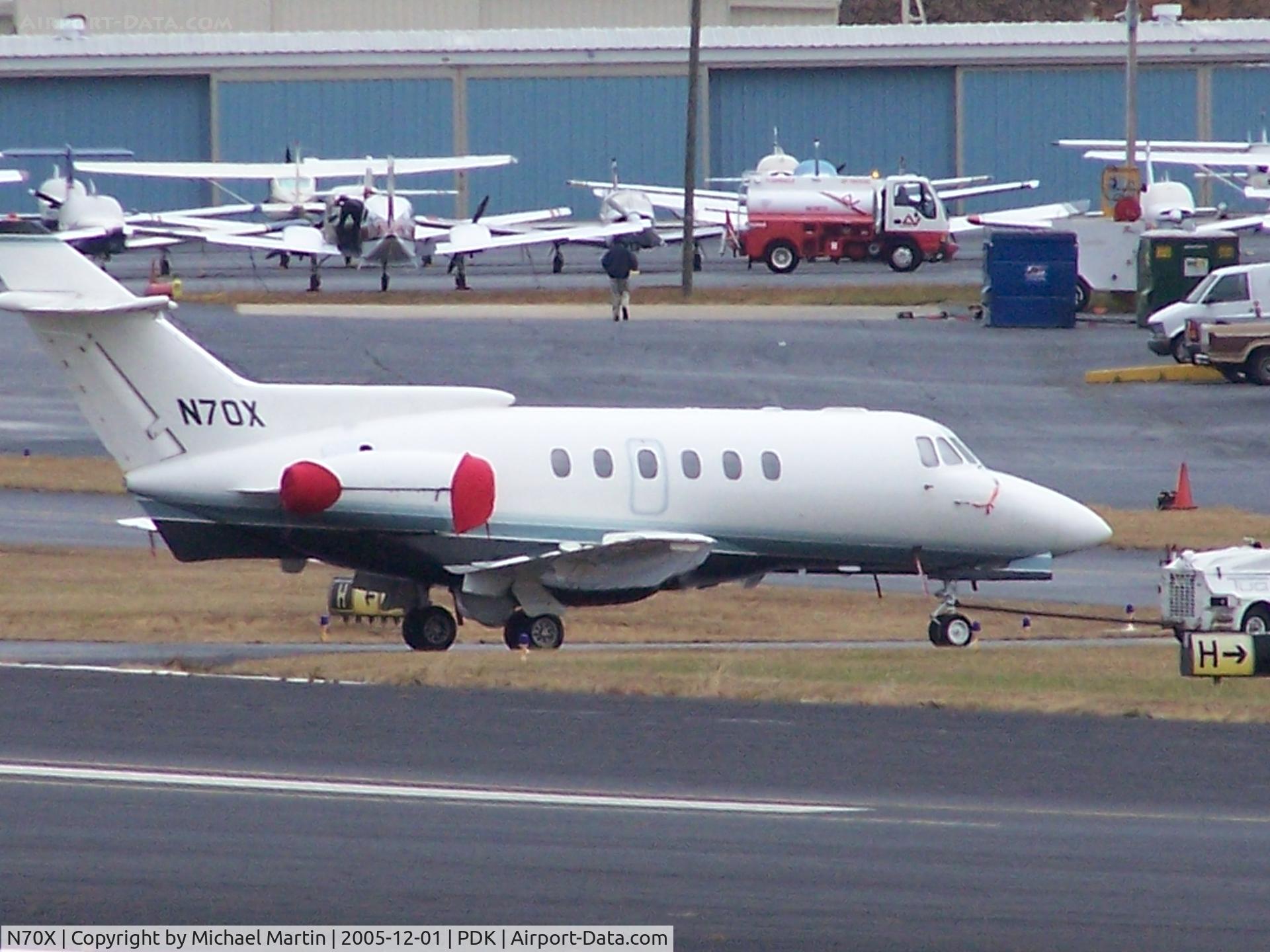 N70X, 1981 Canadair Challenger 600 (CL-600-1A11) C/N 1032, Being towed to parking at Epps Air Service