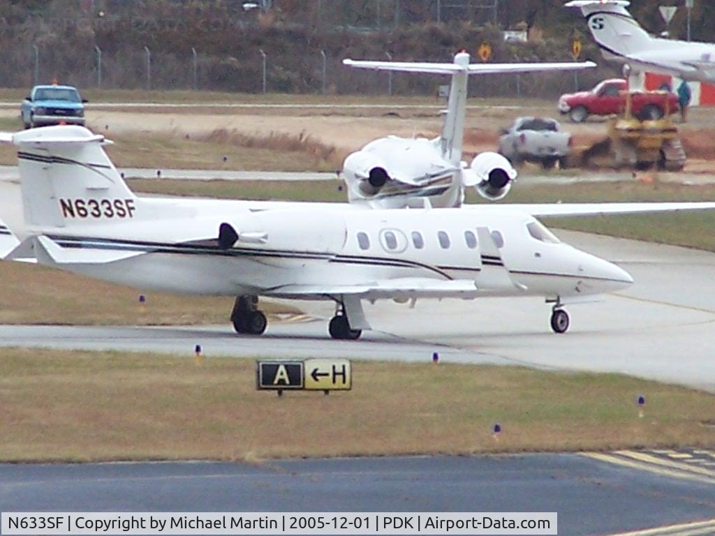 N633SF, 2002 Learjet Inc 31A C/N 241, Taxing to Runway 20L - Busy day!