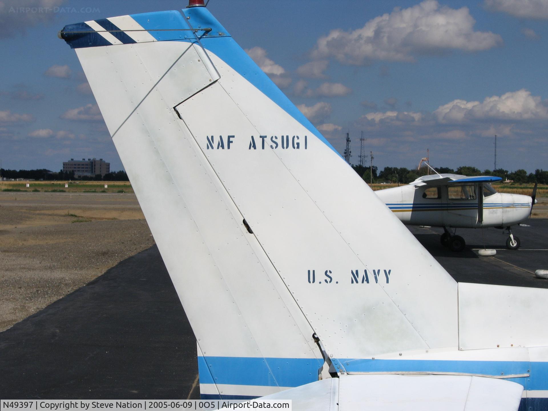 N49397, 1977 Cessna 152 C/N 15281236, close-up of 1977 Cessna 152 painted with NAF Atsugi (Japan) titles at University Airport, Davis, CA