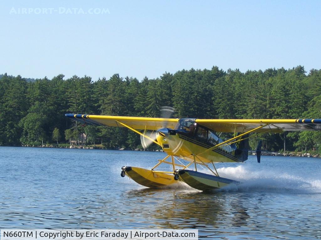 N660TM, 2000 American Champion 8GCBC Scout C/N 407-99, 2000 Scout on Wipline 2100's Amphibs