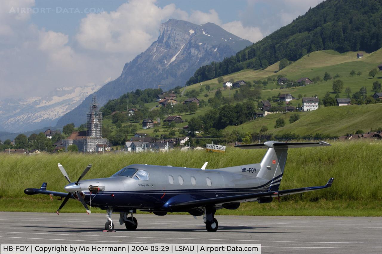 HB-FOY, 2001 Pilatus PC-12/45 C/N 386, flying Ulla, at Buochs Airfield, Switzerland