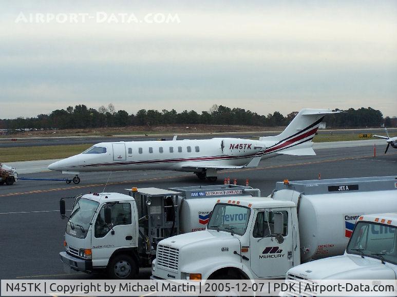 N45TK, 2007 Learjet 45 C/N 338, On tug at Mercury Air Center