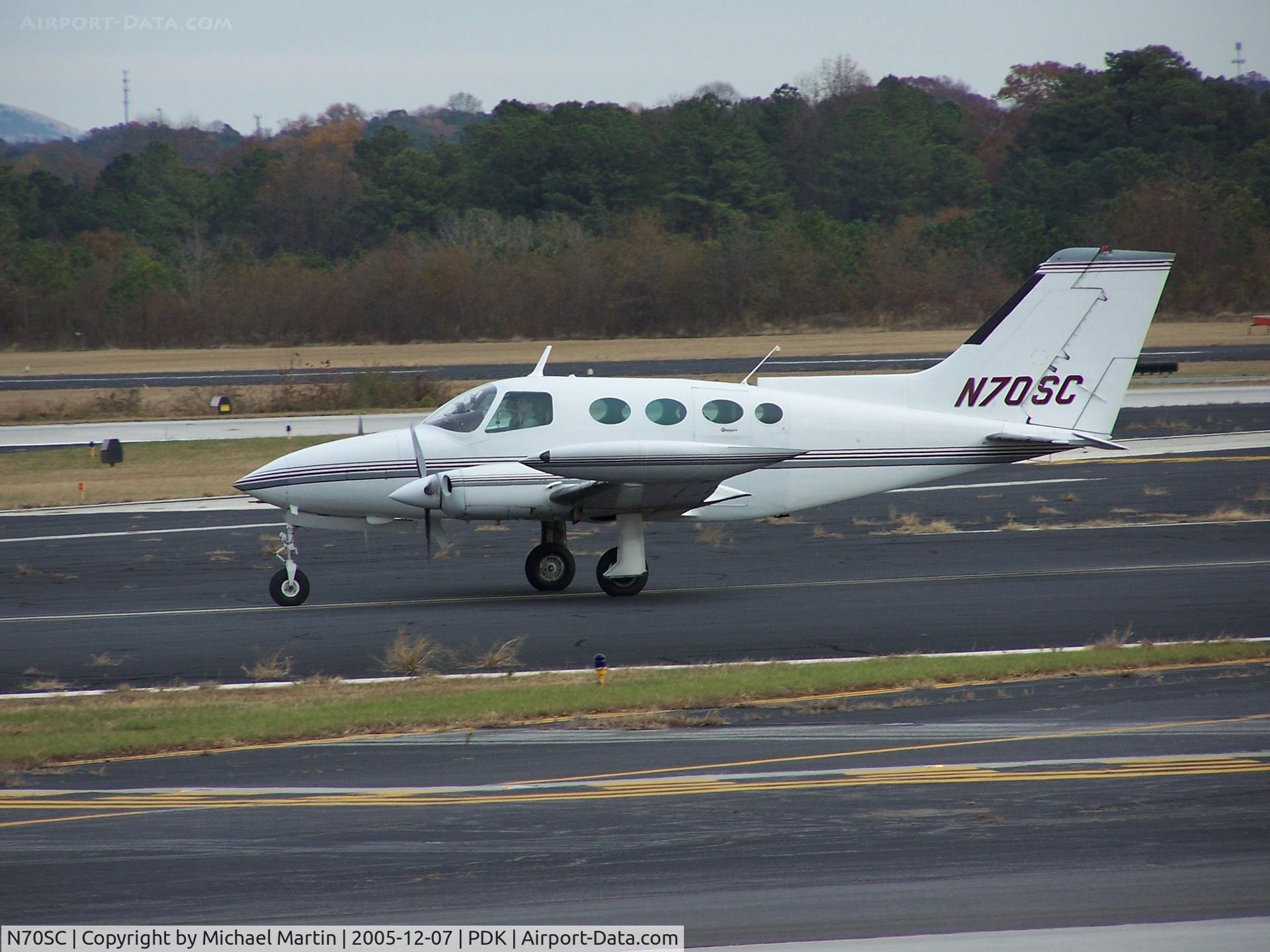 N70SC, Cessna 401A C/N 401A-0032, Arriving PDK taxing to tie down