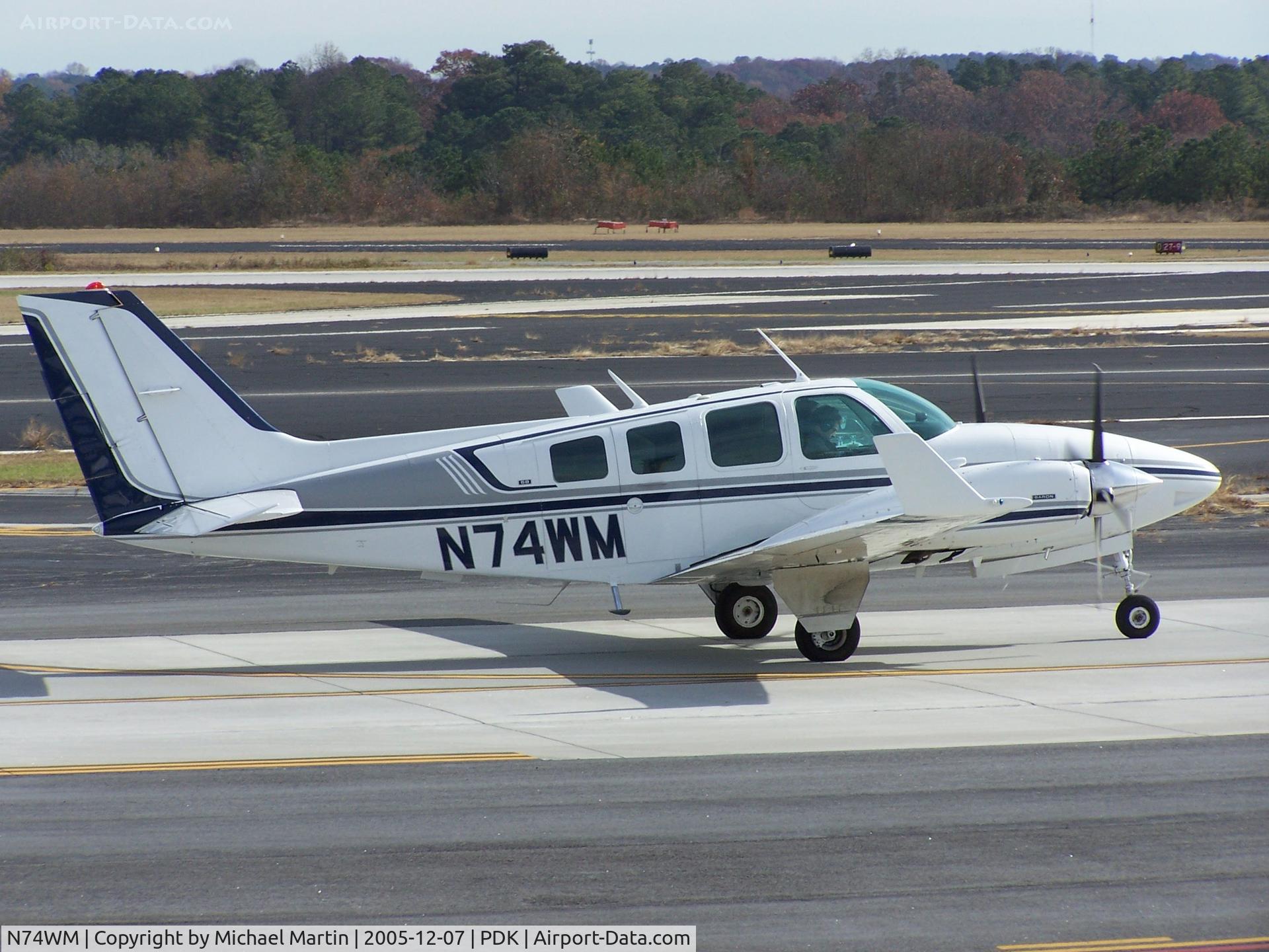 N74WM, 1975 Beech 58 Baron C/N TH-653, Taxing to Runway 2R