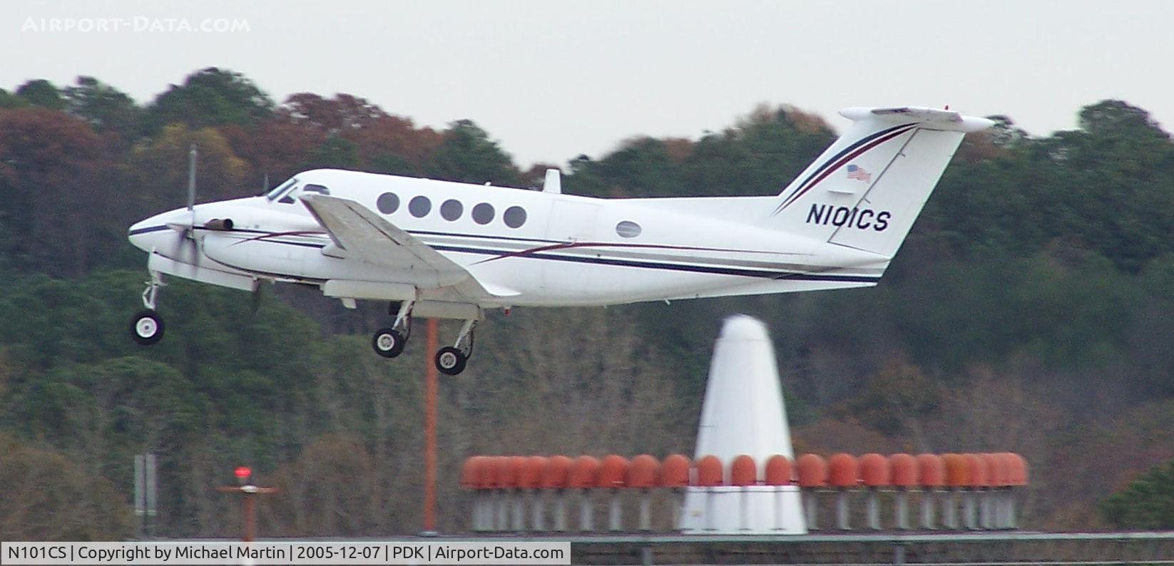 N101CS, 1977 Beech C-12C Huron C/N BC-041, Departing PDK - Starting to rotate gear.