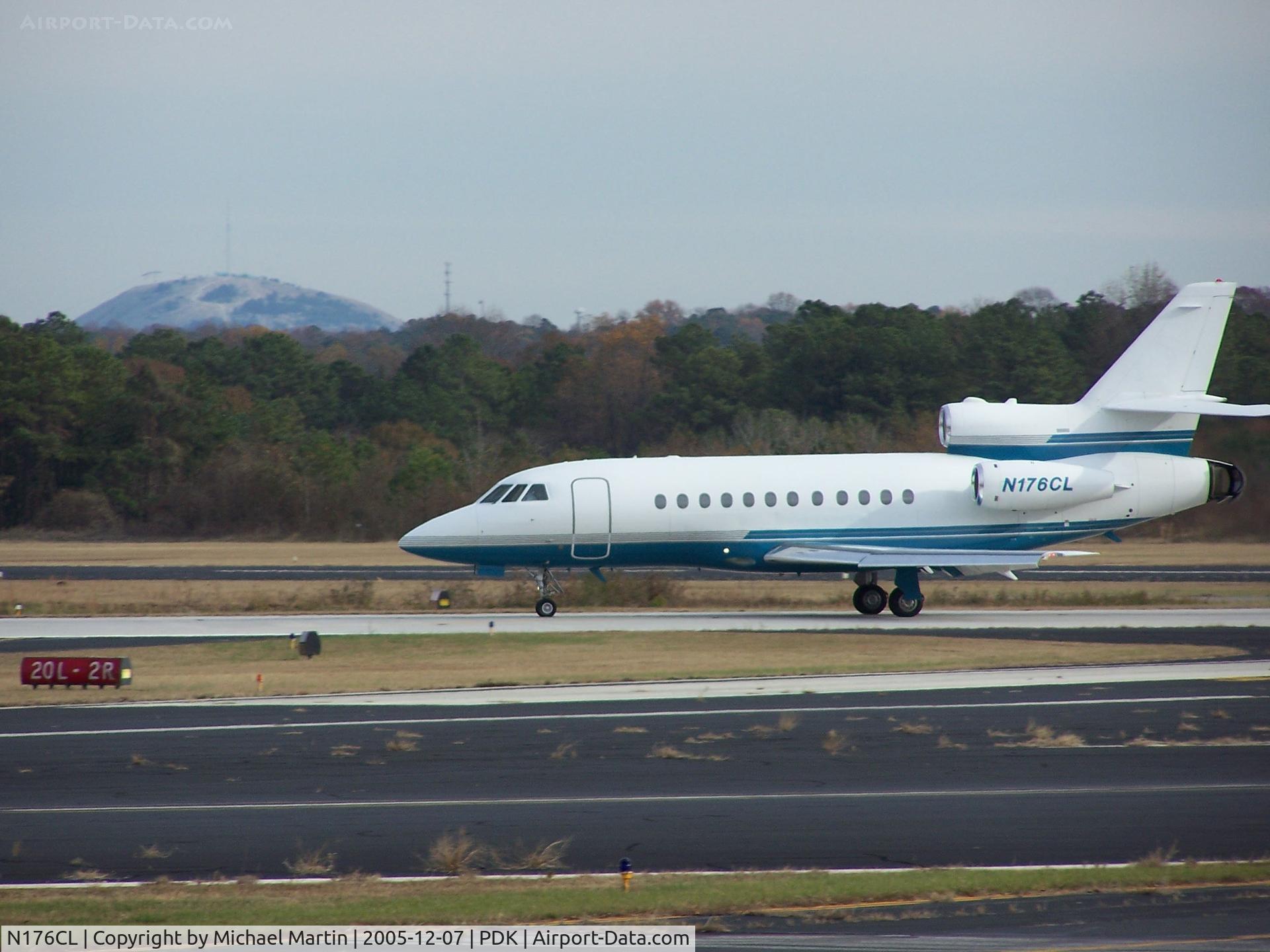 N176CL, 2002 Dassault Falcon 900EX C/N 110, Arriving PDK on 2R with Stone Mountain in the distance.
