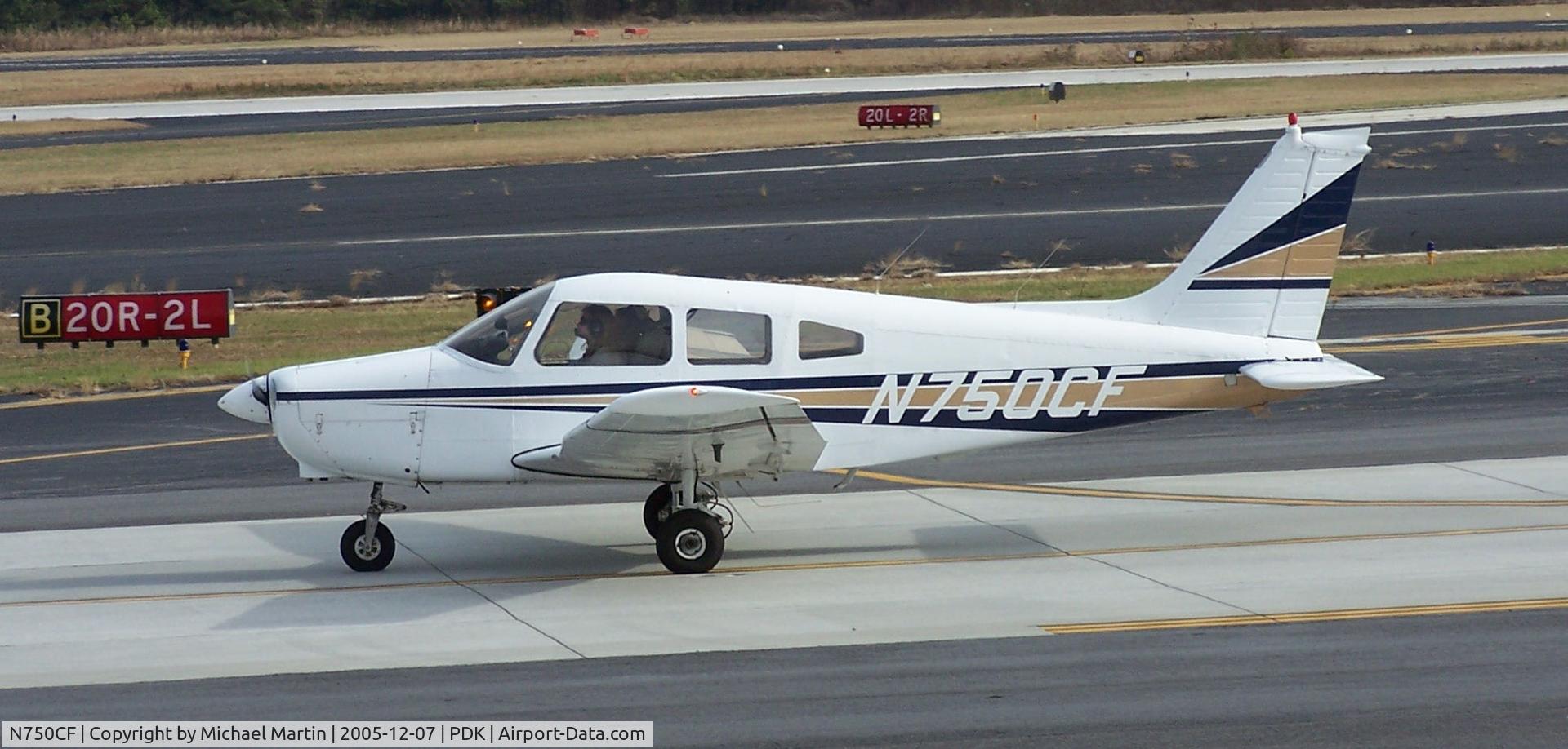 N750CF, 1977 Piper PA-28-161 C/N 28-7716152, Taxing to Epps Air Service