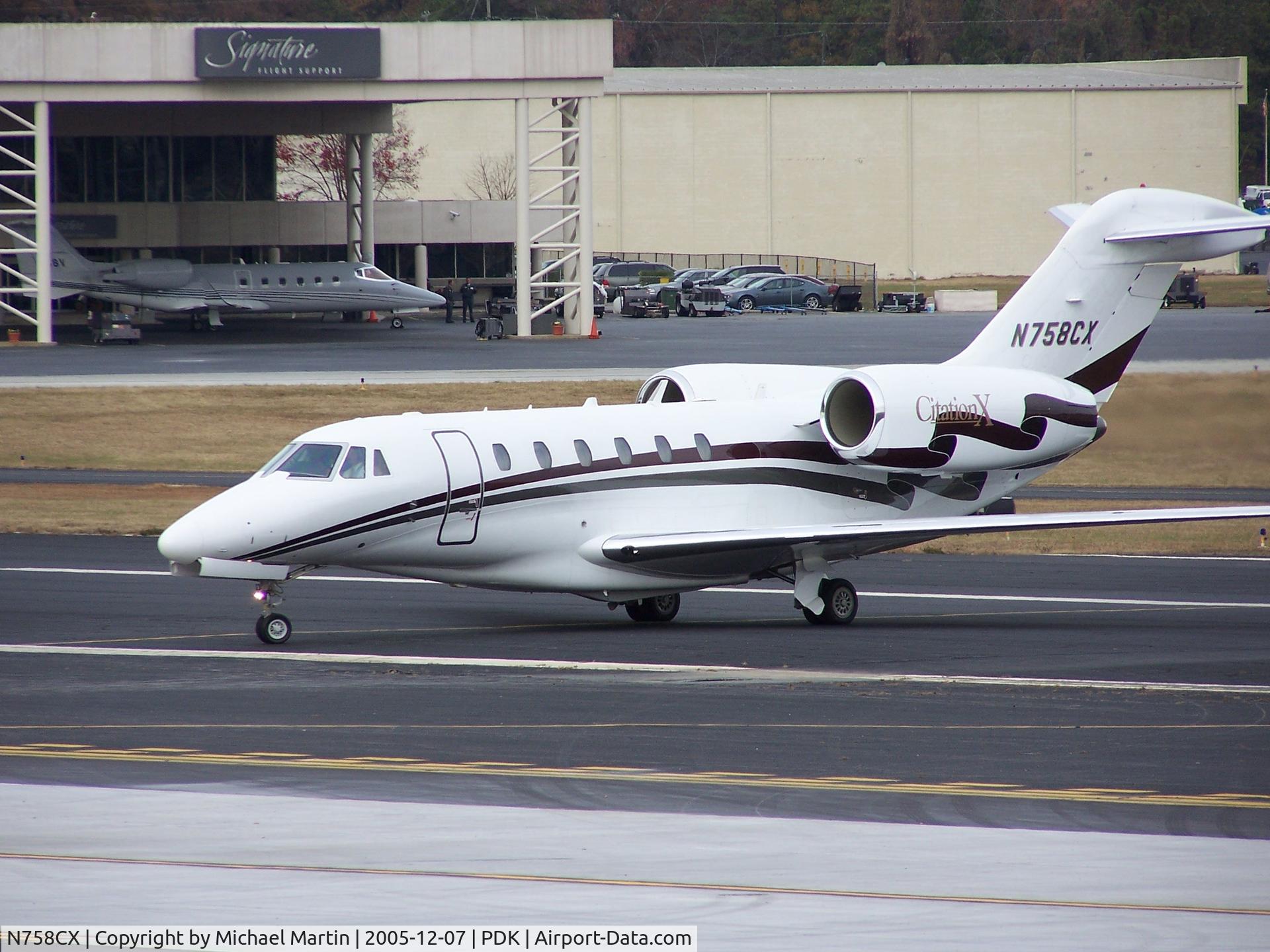 N758CX, 1998 Cessna 750 Citation X Citation X C/N 750-0058, Cool stripes on side of Citation X!
