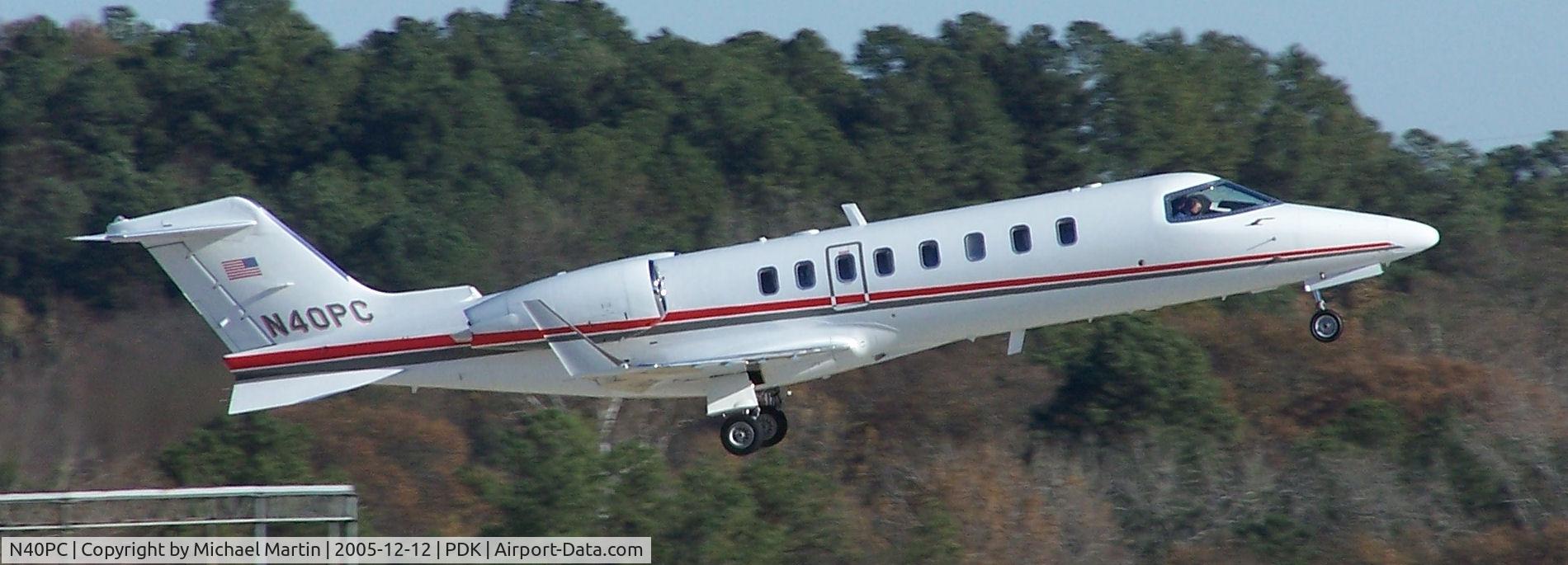 N40PC, 2004 Learjet 45 C/N 259, Southern Companies taking off 20L