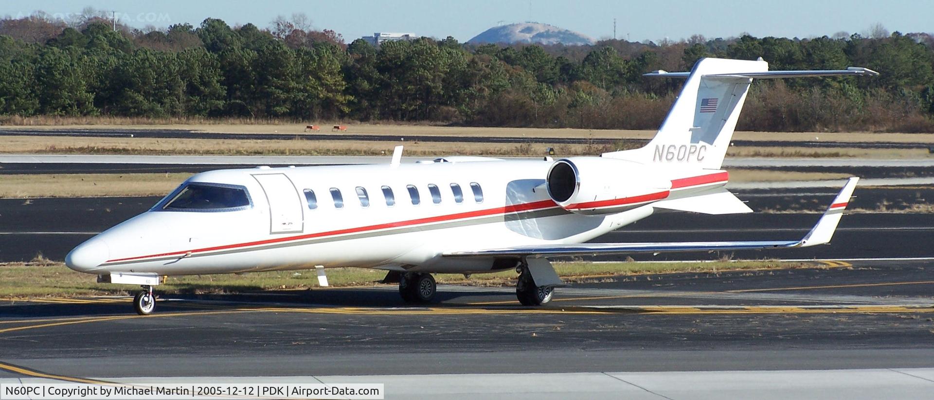 N60PC, 2008 Learjet 45 C/N 351, Southern Companies returning home to PDK