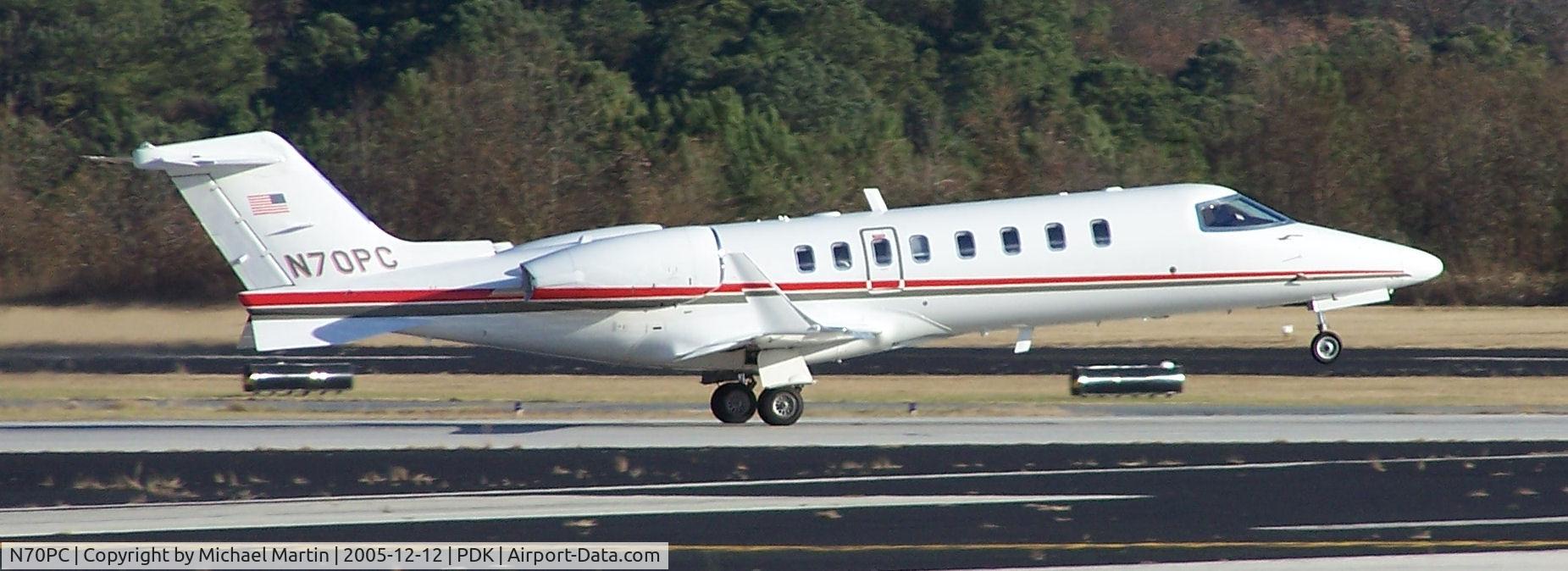 N70PC, 2001 Learjet 45 C/N 172, Southern Companies taking off 20L