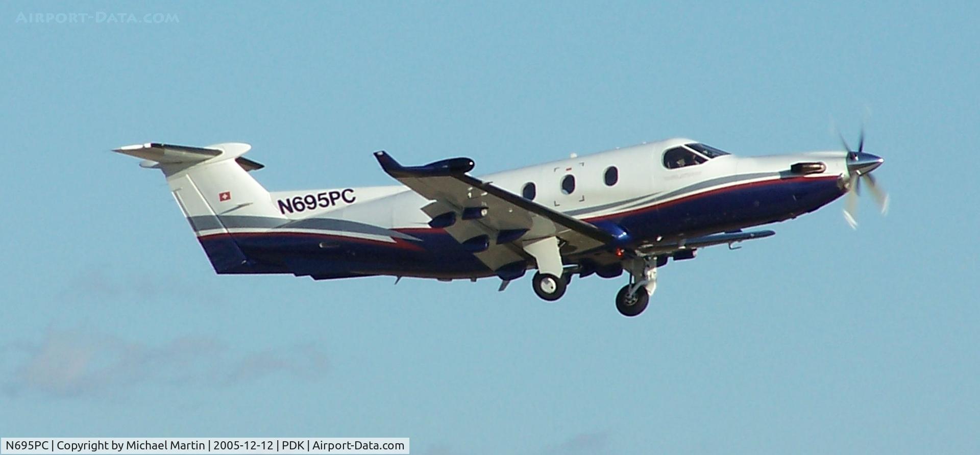 N695PC, 1999 Pilatus PC-12/45 C/N 305, Departing PDK on 20L