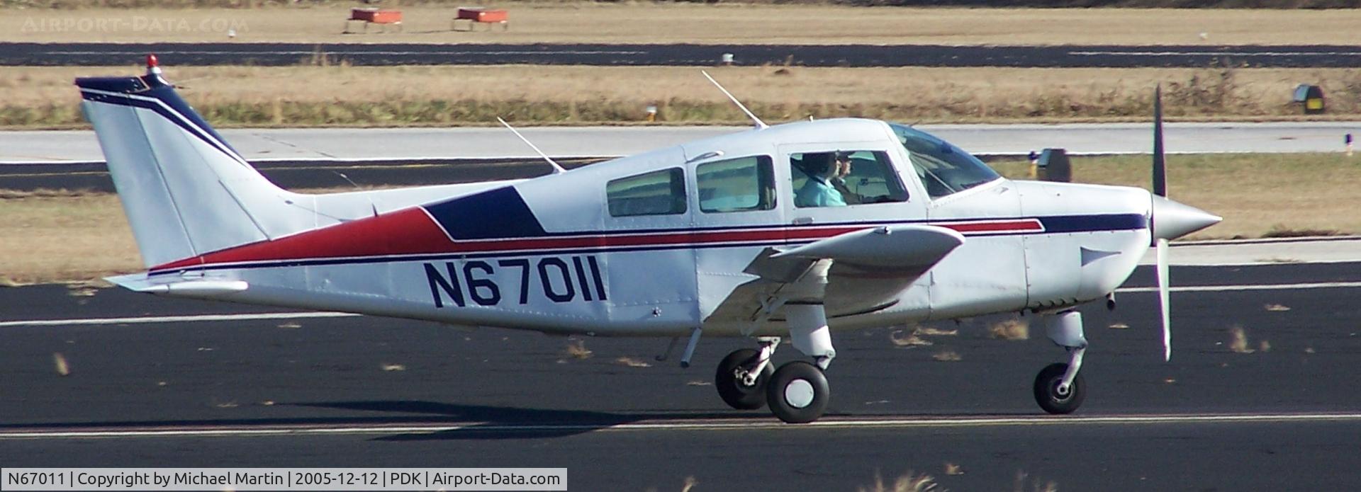 N67011, Beech C23 Sundowner 180 Sundowner 180 C/N M-2228, Just inches from touching down 20R