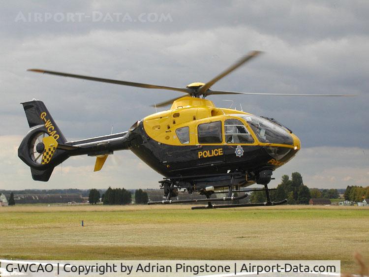 G-WCAO, 2001 Eurocopter EC-135T-2 C/N 0204, Eurocopter EC135T, shared by the police forces of Avon and Somerset, and Gloucestershire, built 2001, photographed at the Heli-Day, Kemble, England, in August 2003