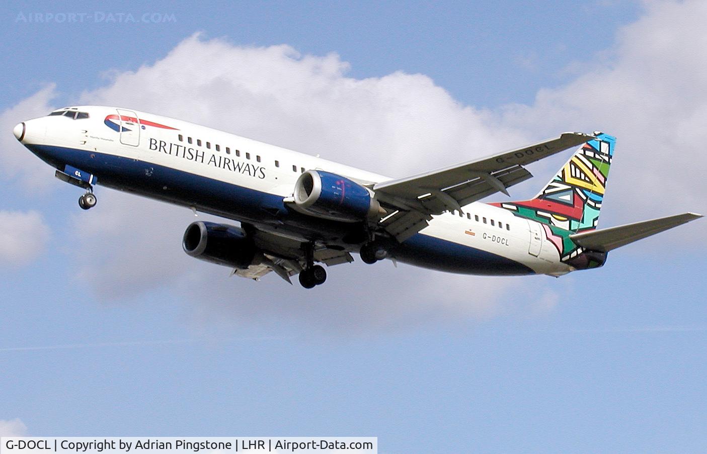 G-DOCL, 1992 Boeing 737-436 C/N 25842, British Airways tail-colour scheme “Ndebele” on a Boeing 737-400 (G-DOCL) approaching London (Heathrow) Airport in 2003
