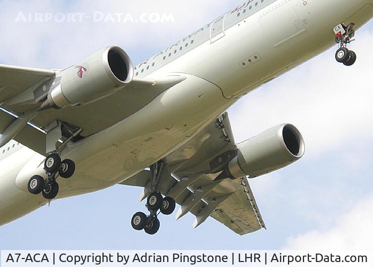 A7-ACA, 2002 Airbus A330-203 C/N 473, The main undercarriage and nose undercarriage of a Qatar Airways A330-300 (A7-ACA), on the approach to London (Heathrow) Airport, England in August 2002