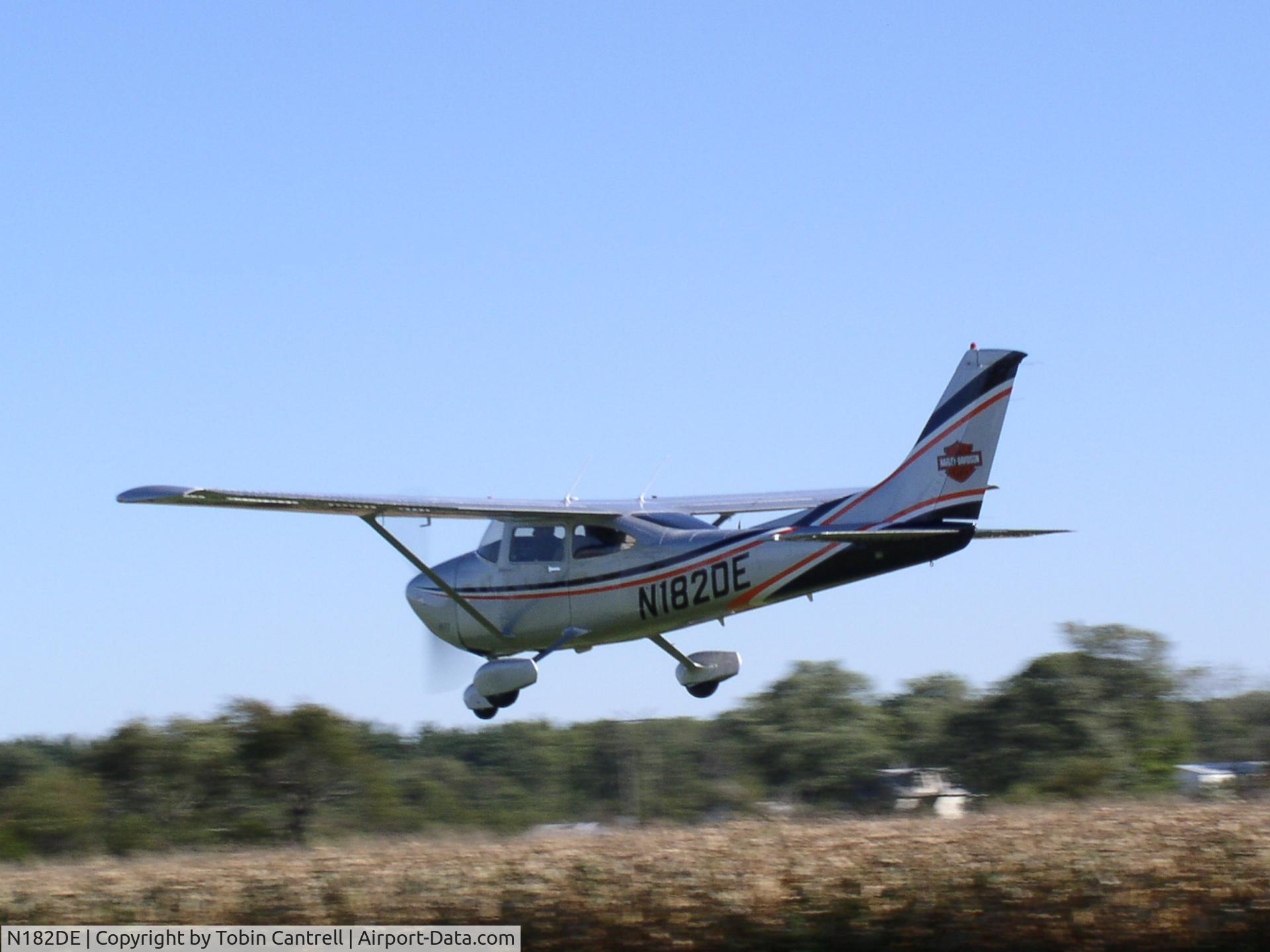 N182DE, 1985 Cessna 182R Skylane C/N 18268540, Fly by over our grass strip.