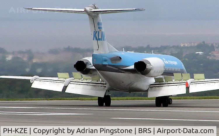 PH-KZE, 1996 Fokker 70 (F-28-0070) C/N 11576, KLM Fokker 70 (PH-KZE) landing at Bristol Airport, Bristol, England in August 2004. The airbrake flight controls are the raised cream-coloured panels on the wing upper surface.