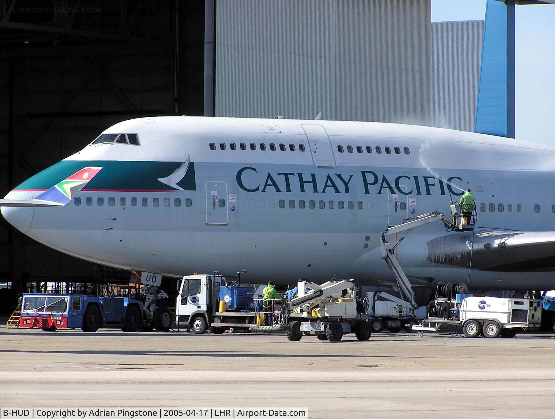 B-HUD, 1992 Boeing 747-467 C/N 25874, Cathay Pacific Boeing 747-400 (B-HUD) being cleaned in the maintenance area at London (Heathrow) Airport, England in April 2005