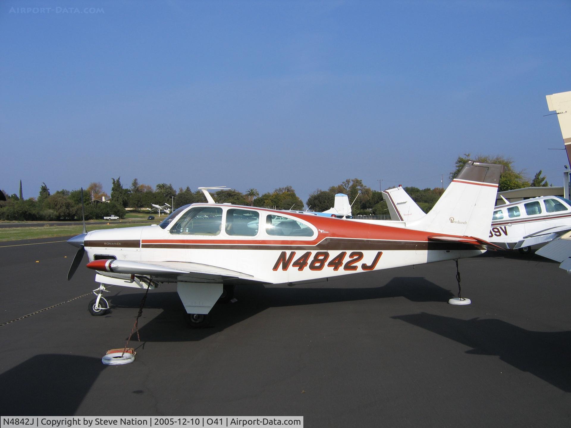 N4842J, 1966 Beech 35-C33A Debonair C/N CE-123, 1965 Beech A35-C33A at Woodland-Watts Airport, CA in December sun