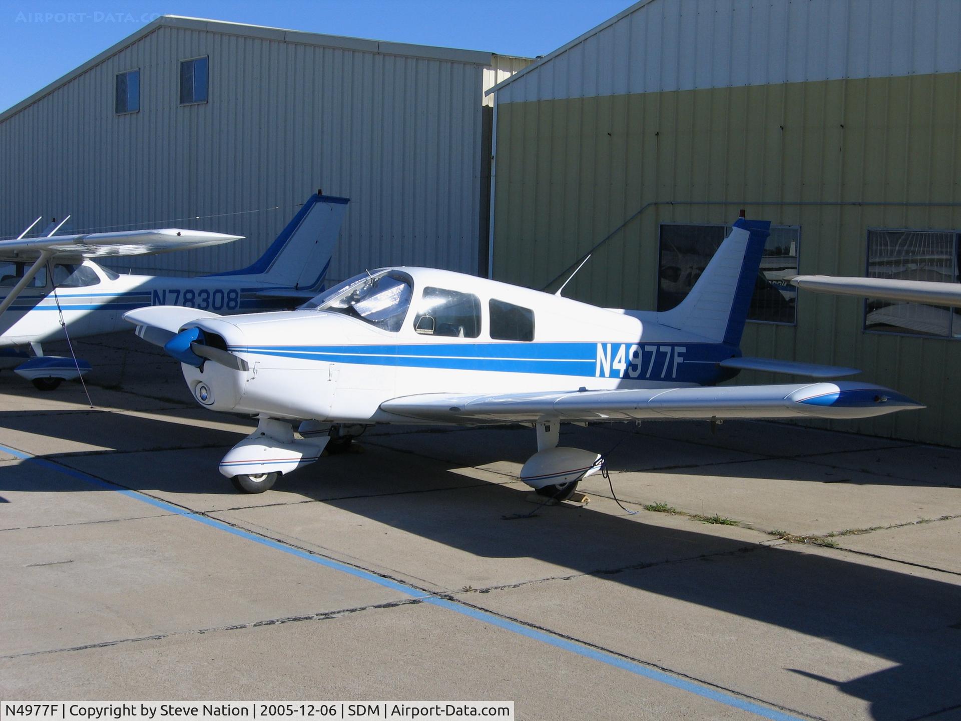 N4977F, 1976 Piper PA-28-140 C/N 28-7725038, 1976 Piper PA-28-140  in sun/shade at Brown Field (San Diego), CA