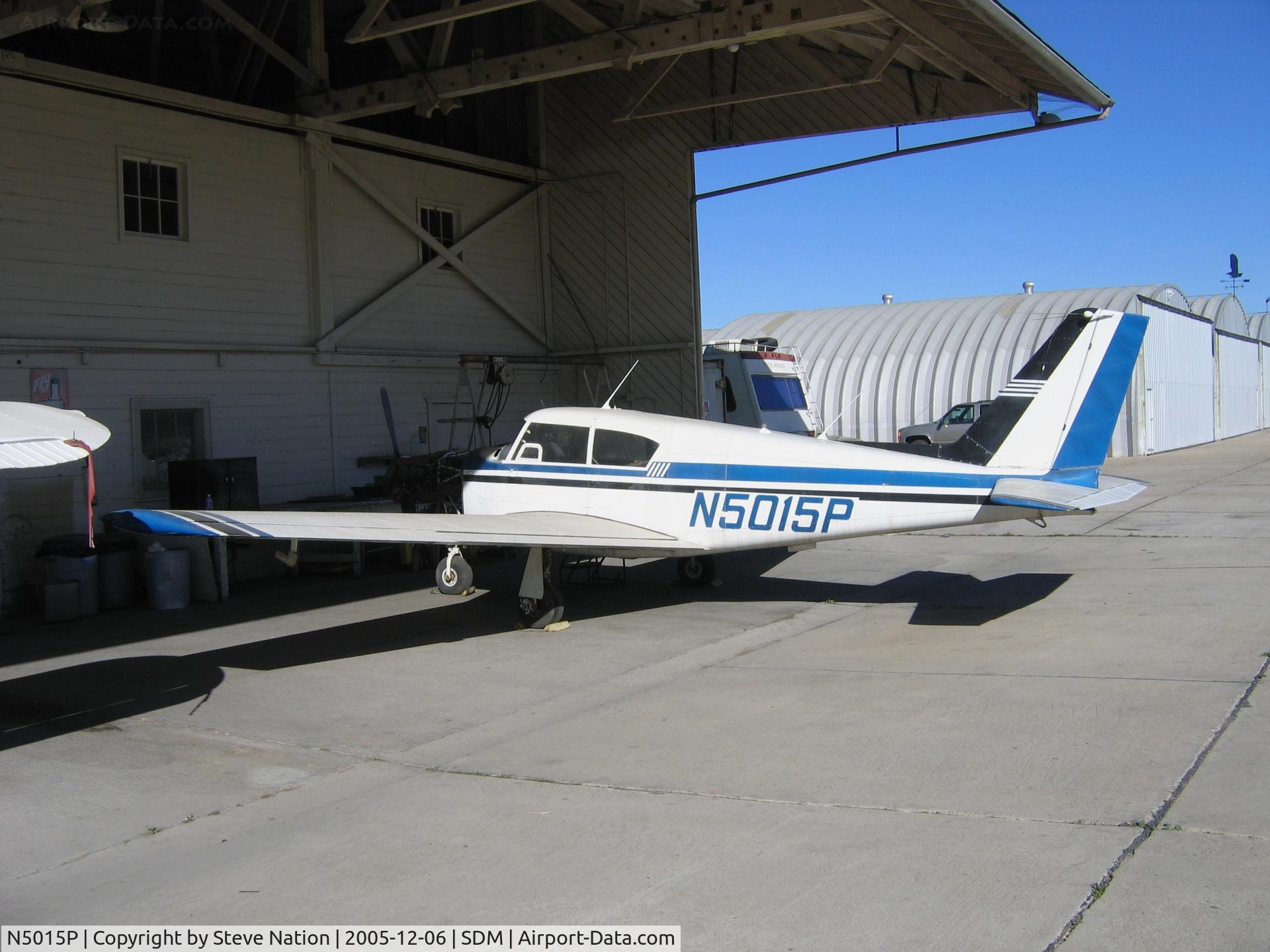 N5015P, 1958 Piper PA-24 C/N 24-18, First Flight Corp. 1958 Piper PA-24  in sun/shade at Brown Field (San Diego), CA