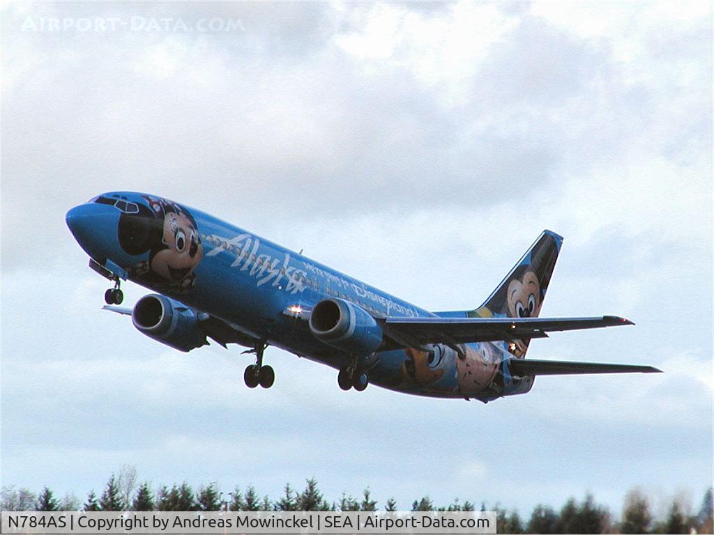N784AS, 1996 Boeing 737-4Q8 C/N 28199, Alaska Airlines Boeing 737 in Micky Mouse livery taking off from Seattle-Tacoma International Airport