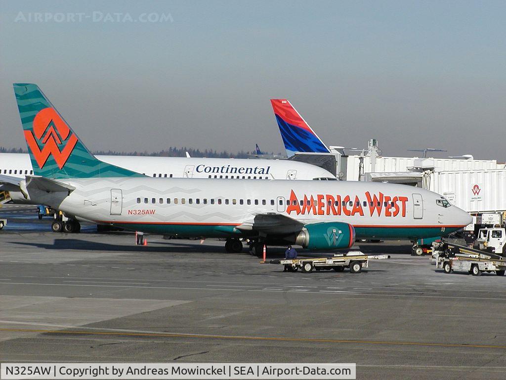 N325AW, 1985 Boeing 737-301F C/N 23260, America West Airlines Boeing 737 loading passengers at Seattle-Tacoma International Airport