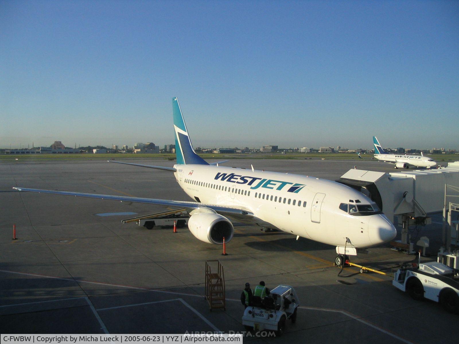 C-FWBW, 2003 Boeing 737-7CT C/N 33697, Docked at Terminal 2 in Toronto
