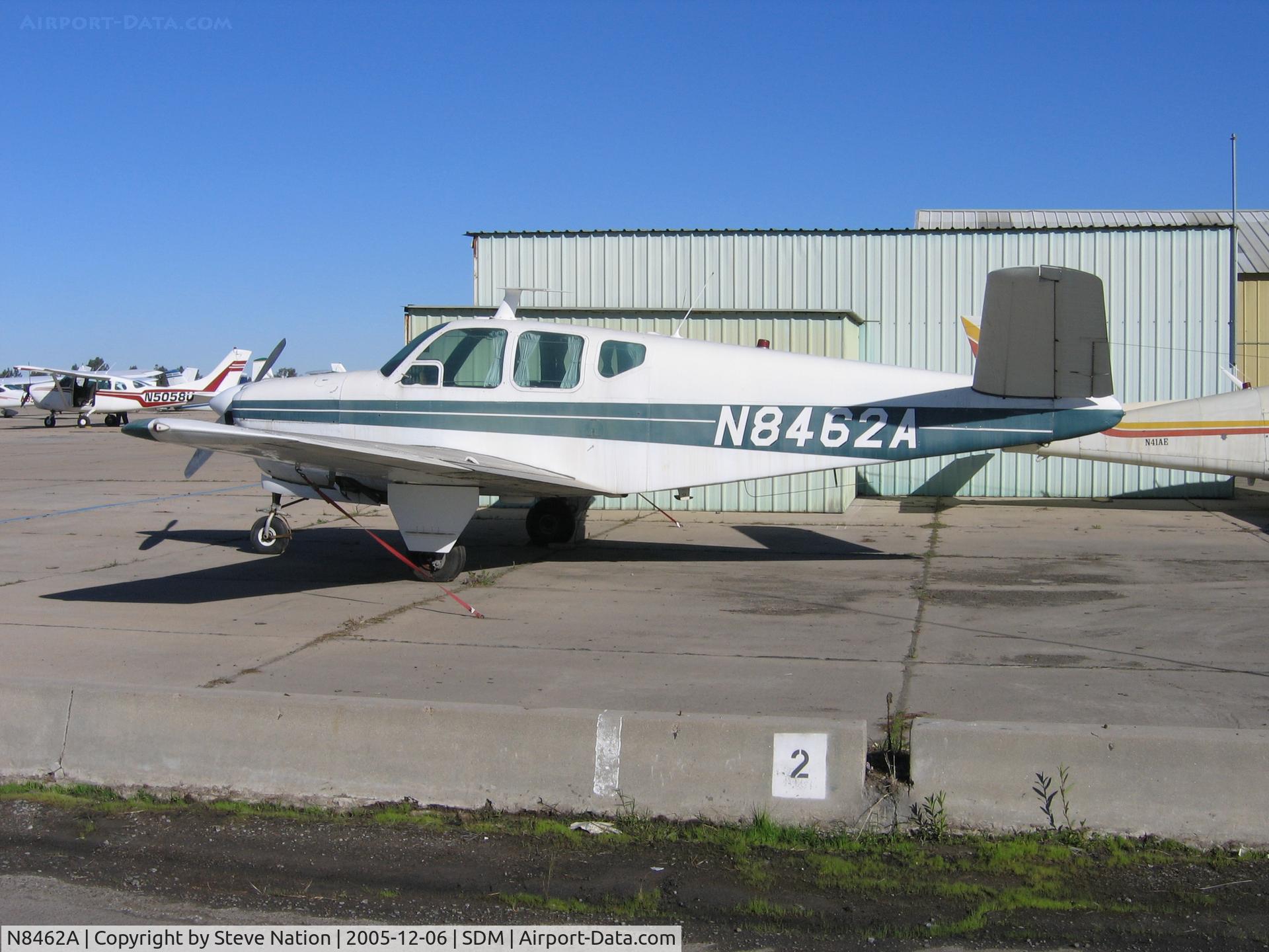 N8462A, 1948 Beech A35 Bonanza C/N D-1880, CMB Maquilla Services 1948 Beech A35 in bright sun at Brown Field (San Diego), CA