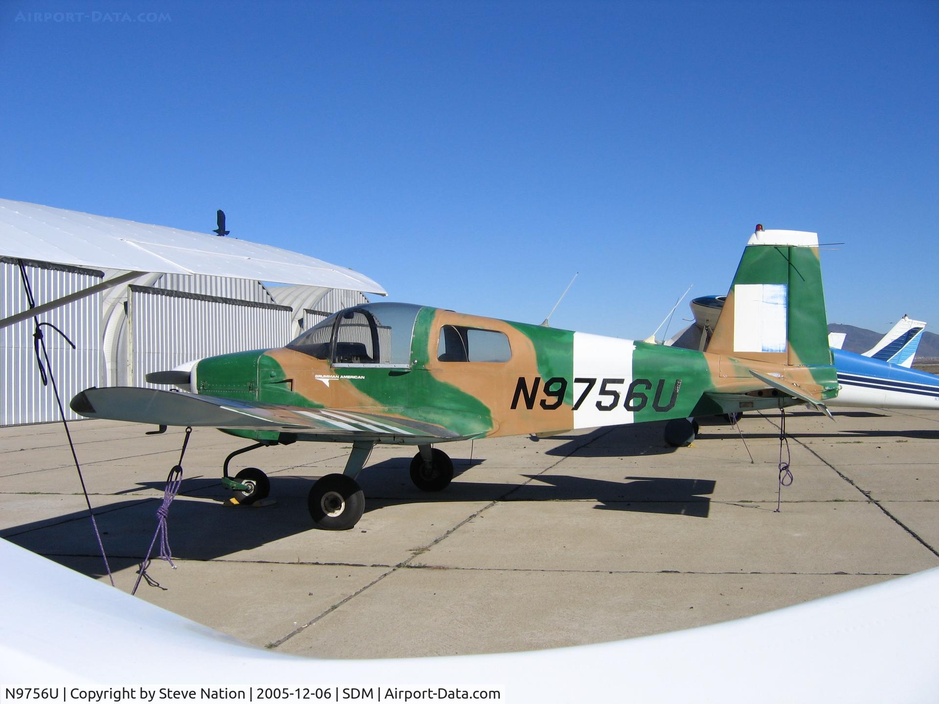 N9756U, 1977 Grumman American AA-1C Lynx C/N AA1C0115, First Flight Corp. 1977 Grumman American AA-1C in bright sun at Brown Field (San Diego), CA. Destroyed April 23, 2006 after stalling and hitting the ground and a fence shortly after take-off from Brown Field.  Two onboard OK.