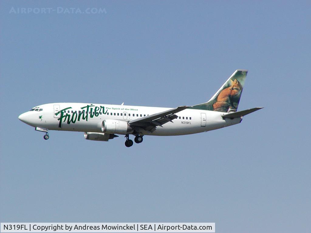 N319FL, 1994 Boeing 737-3Q8 C/N 26301, Frontier Airlines no longer operates 737 to SEA. This aircraft has been sold to Madagascar.