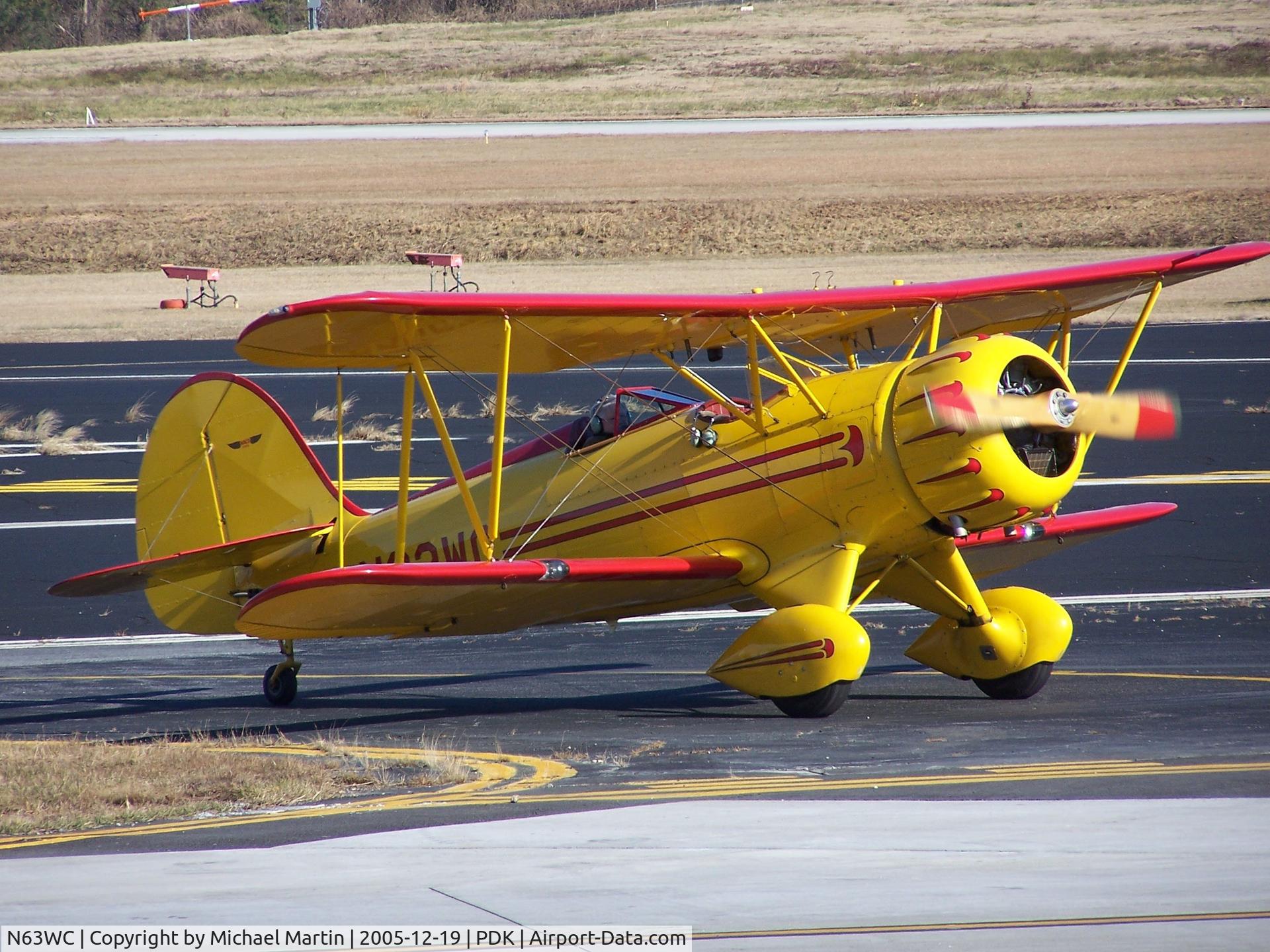 N63WC, 1997 Waco YMF C/N F5C-077, Repositioning to 57th Fighter Group Resturant