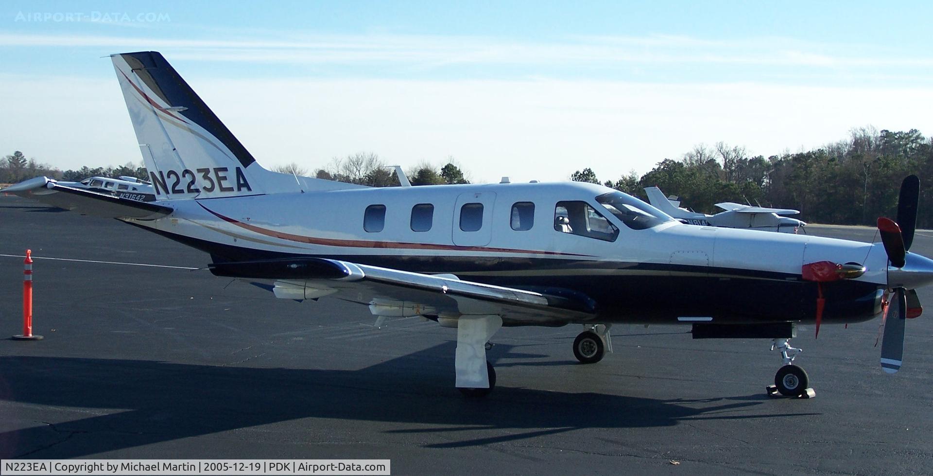 N223EA, 2005 Socata TBM-700 C/N 323, Tied down @ PDK