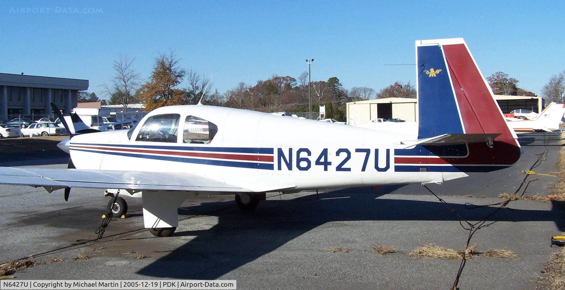 N6427U, 1962 Mooney M20C Ranger C/N 2174, Tied down @ PDK