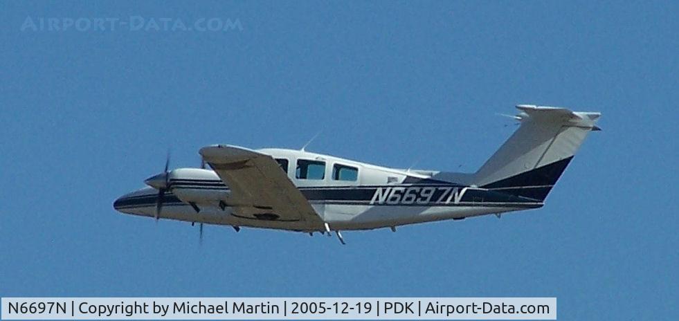 N6697N, 1979 Beech 76 Duchess C/N ME-272, Departing PDK