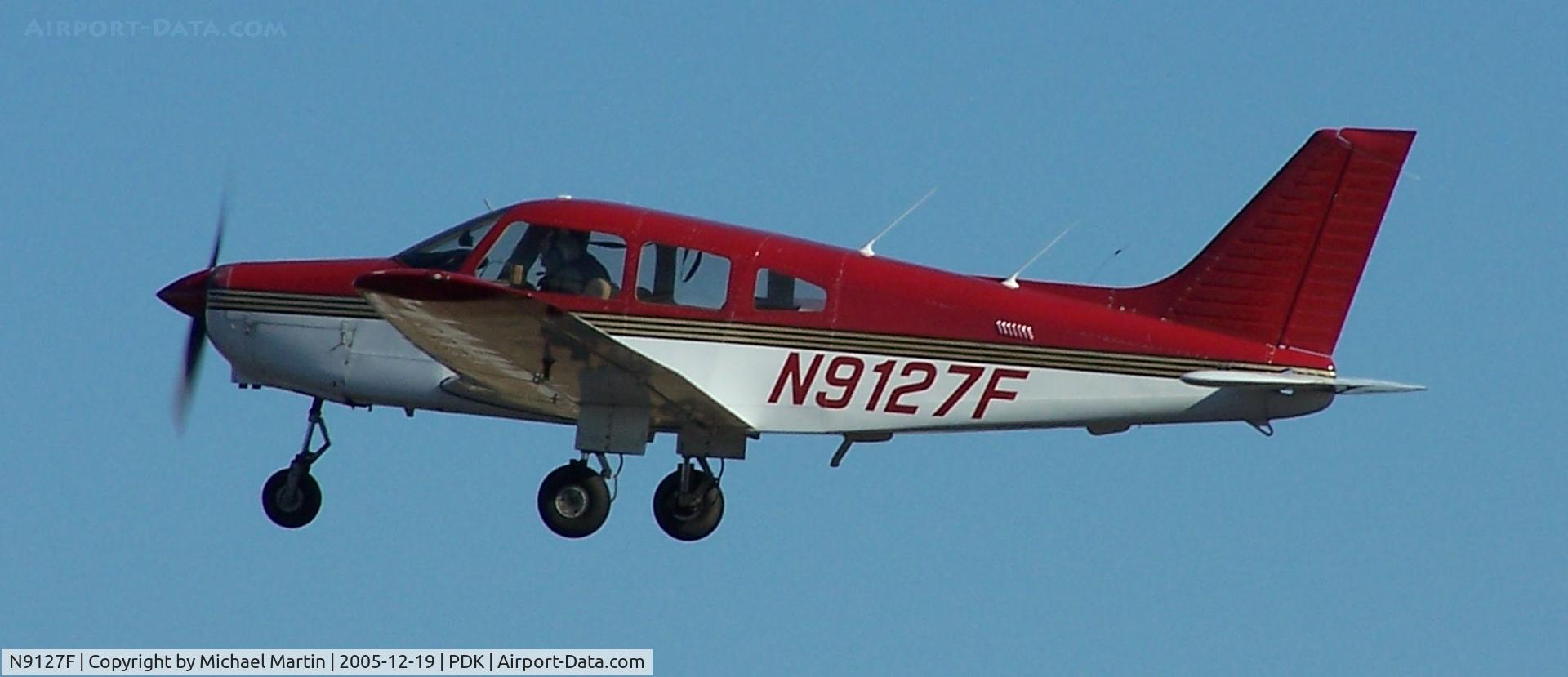 N9127F, 1993 Piper PA-28-161 C/N 2816106, Departing PDK