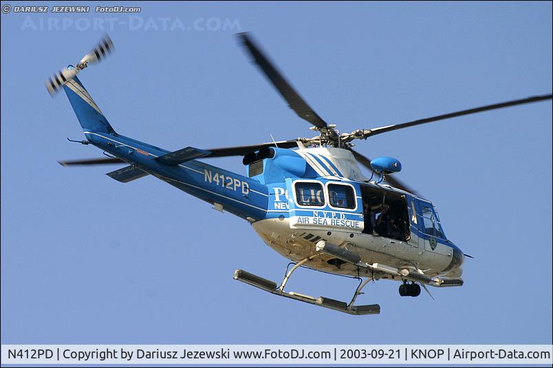 N412PD, 1996 Bell 412EP C/N 36142, Patrolling over Coney Island shore