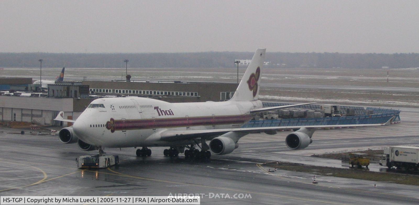 HS-TGP, 1994 Boeing 747-4D7 C/N 26610, HS-TGP being towed to the gate