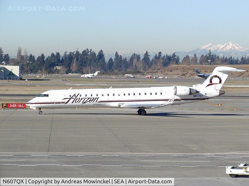 N607QX, 2001 Bombardier CRJ-701 (CL-600-2C10) Regional Jet C/N 10024, Horizon CRJ-700 at Seattle-Tacoma International Airport.