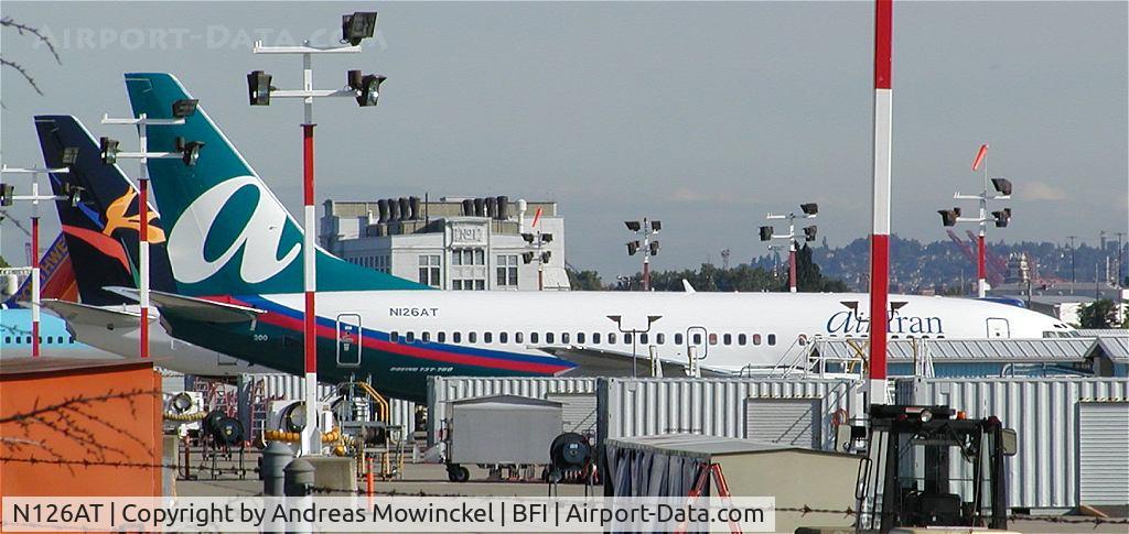 N126AT, 2004 Boeing 737-76N C/N 32679, airTran's first 737-76N.  Not a great shot, but it was taken right after it was painted.  Probably the first picture of the aircraft in the new livery.