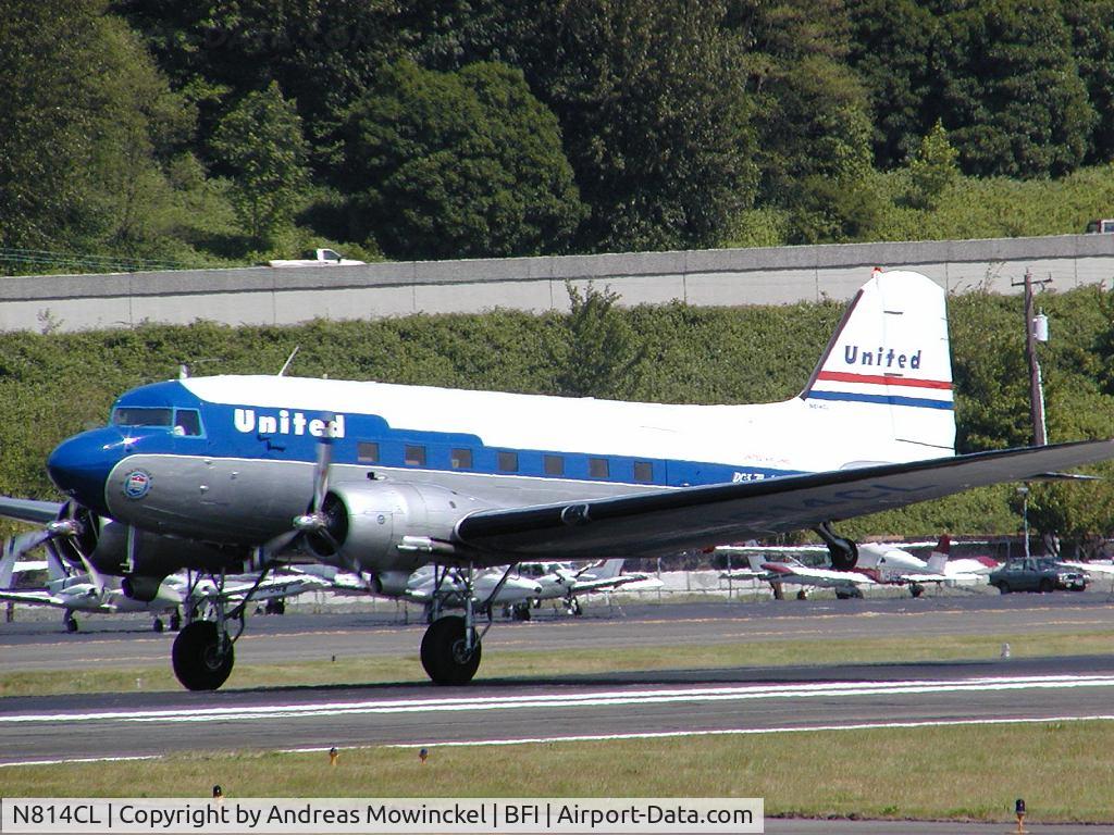 N814CL, 1945 Douglas DC-3C (C-47B-50-DK) C/N 34370, This DC-3 of Clay Lacy Aviation is painted in United colors and is a popular guest at airshows and other aviation arrangements.  Here on display at the Boeing Field Museum of Flight, May 2004.