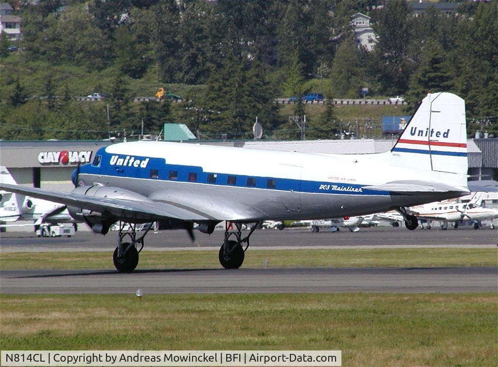N814CL, 1945 Douglas DC-3C (C-47B-50-DK) C/N 34370, This DC-3 of Clay Lacy Aviation is painted in United colors and is a popular guest at airshows and other aviation arrangements.  Here on display at the Boeing Field Museum of Flight, May 2004.