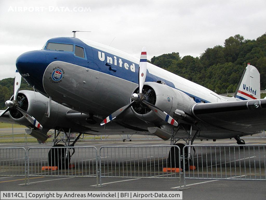 N814CL, 1945 Douglas DC-3C (C-47B-50-DK) C/N 34370, This DC-3 of Clay Lacy Aviation is painted in United colors and is a popular guest at airshows and other aviation arrangements.  Here on display at the Boeing Field Museum of Flight, May 2004.