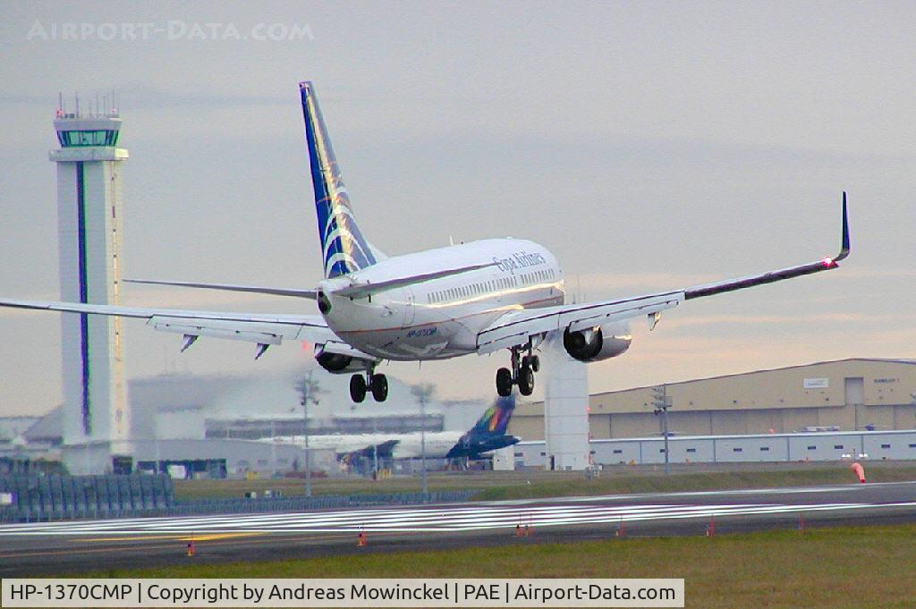 HP-1370CMP, 1999 Boeing 737-71Q C/N 29048, COPA B737 landing at Paine Field Airport after a test flight after having installed winglets