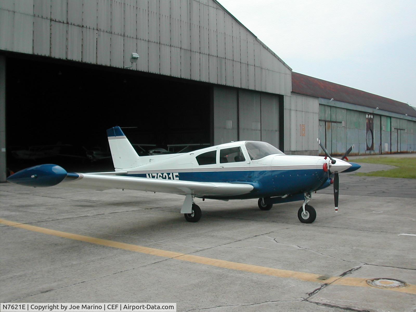 N7621E, 1960 Piper PA-24-250 Comanche C/N 24-2168, Out on the tarmac in front of Hanger 18 at CEF
