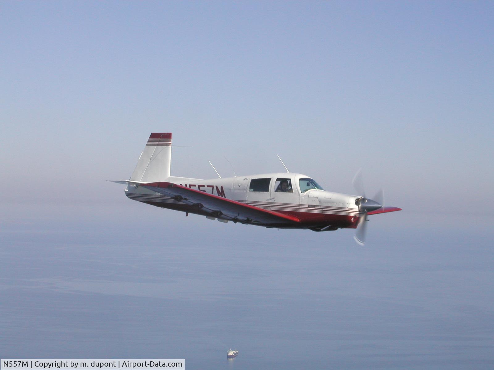 N557M, 1965 Mooney M20C Ranger C/N 3175, in flight