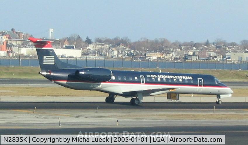 N283SK, 2001 Embraer ERJ-145LR (EMB-145LR) C/N 145424, At New York's La Guardia Airport on New Year's Day