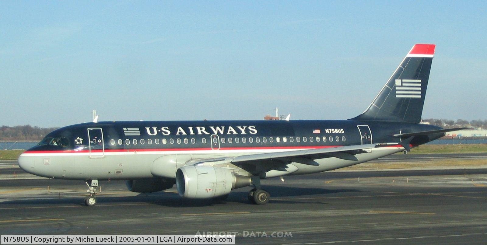 N758US, 2000 Airbus A319-112 C/N 1348, Taxiing to the gate on New Year's Day